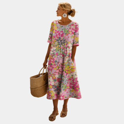 ABITO MIDI FLOREALE LEGGERO E FLUIDO